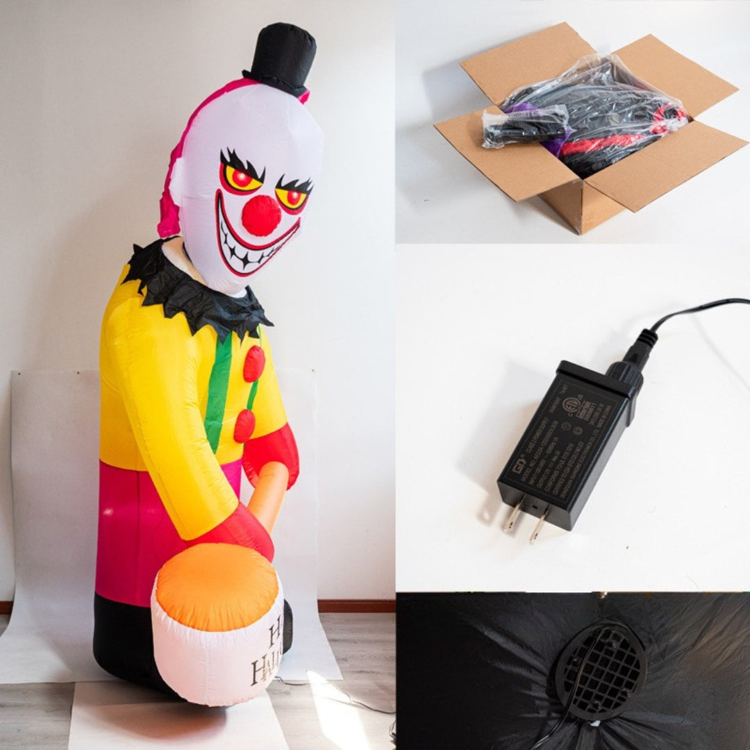 Inflatable clown toy with packaging, adapter, and air blower on a white background