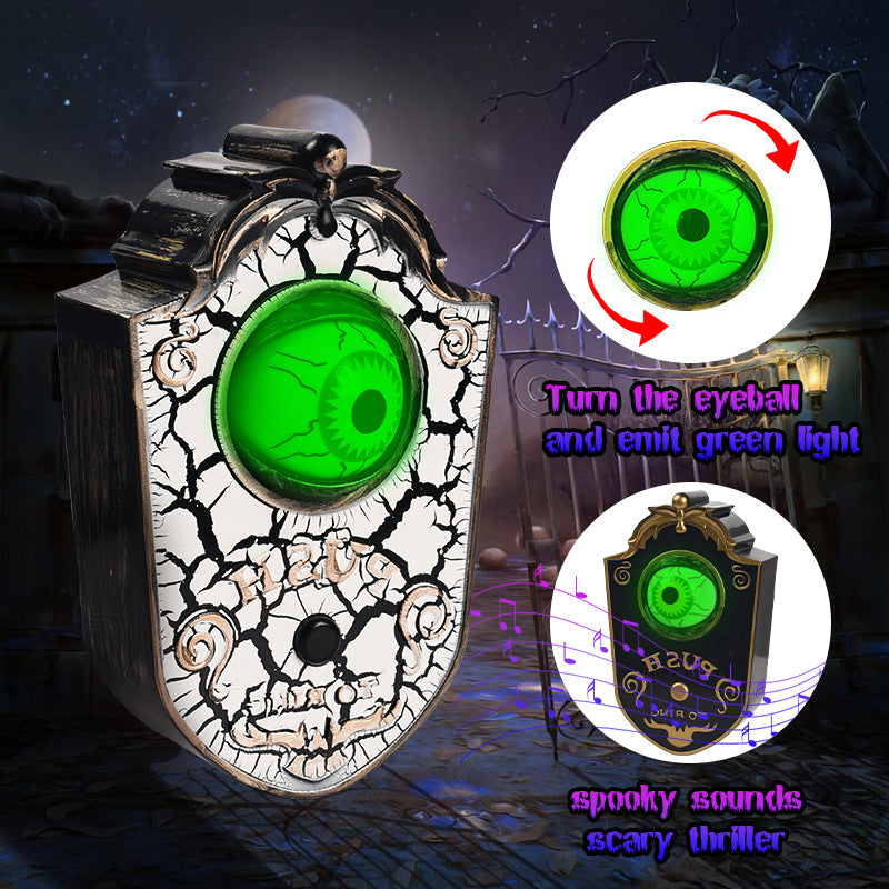 Spooky eye-shaped light with green glowing eyes and Halloween-themed text on a dark background.